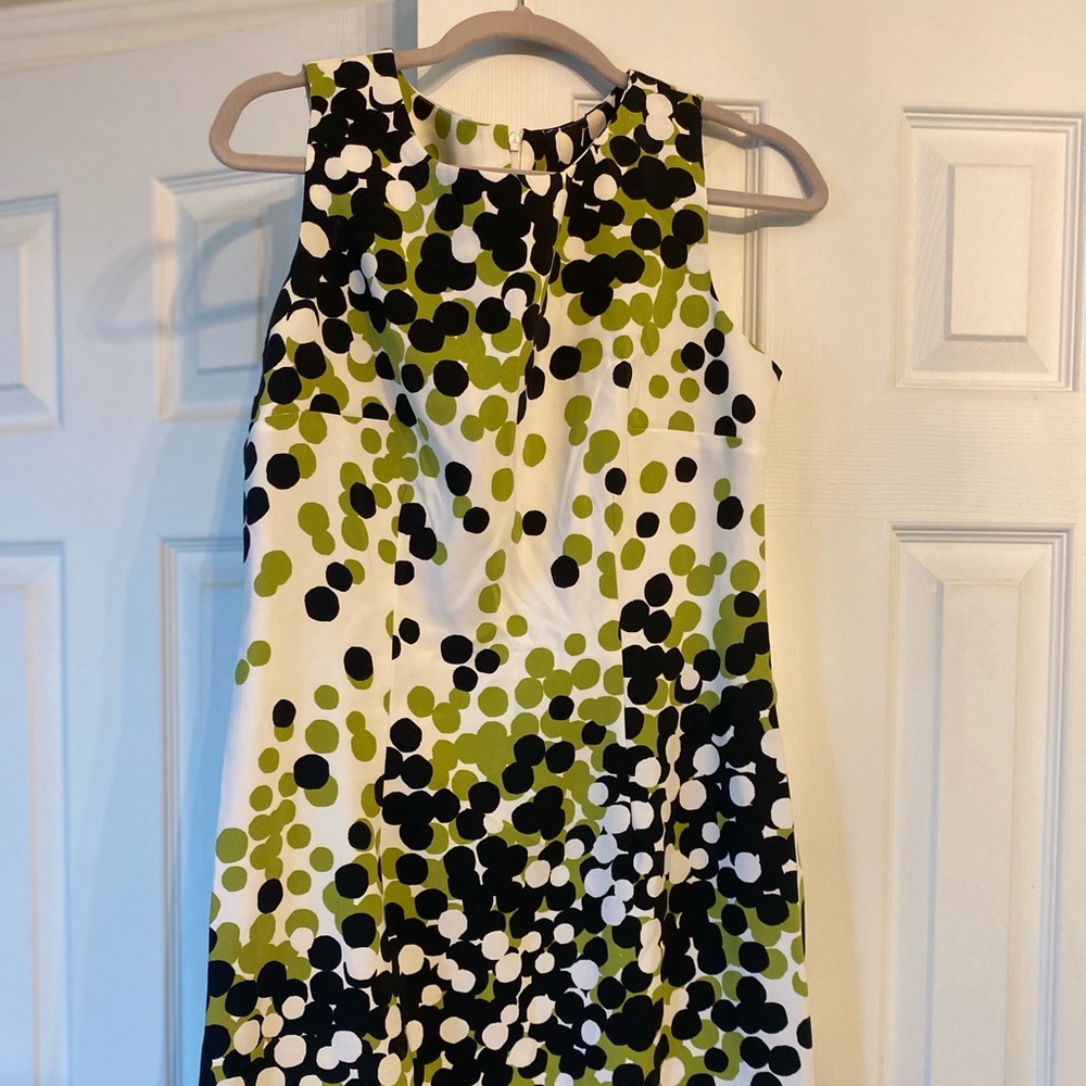 Ronni Nichole dress. Sz 10mid length sleeveless. Multi color